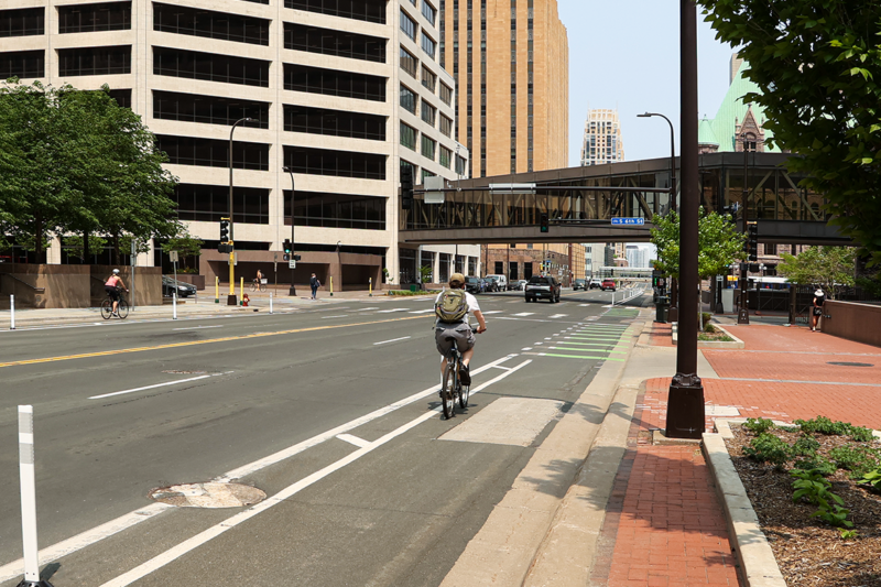 3rd Avenue, Downtown Minneapolis. Buffer bike lane designed by Alliant